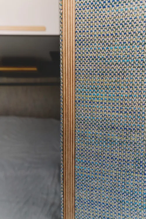 Edge of a woven upholstery panel