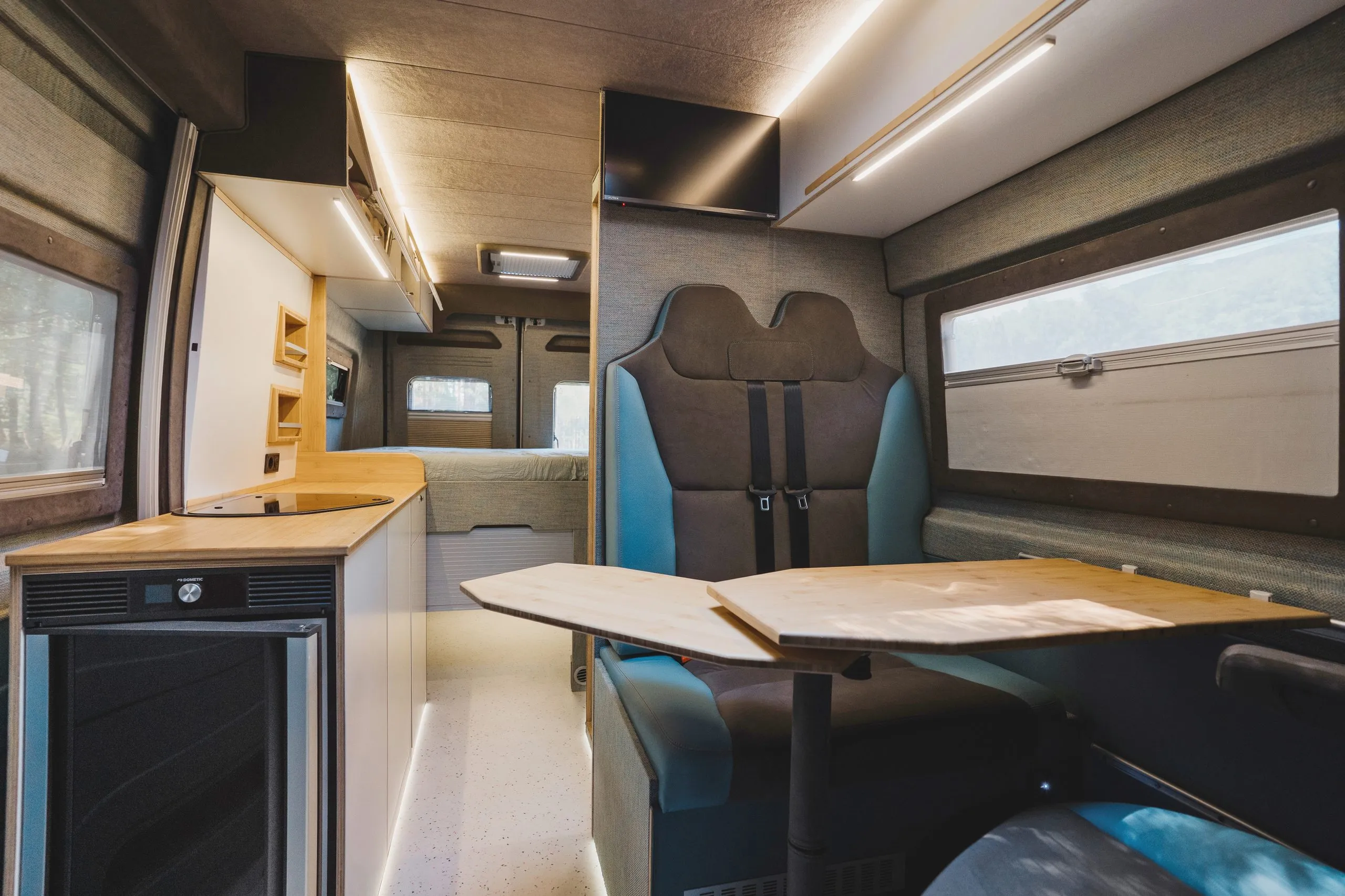 Lounge seating, looking towards the back of the van