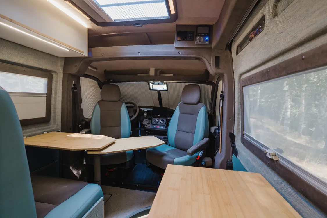Lounge seating and table, looking towards the cab